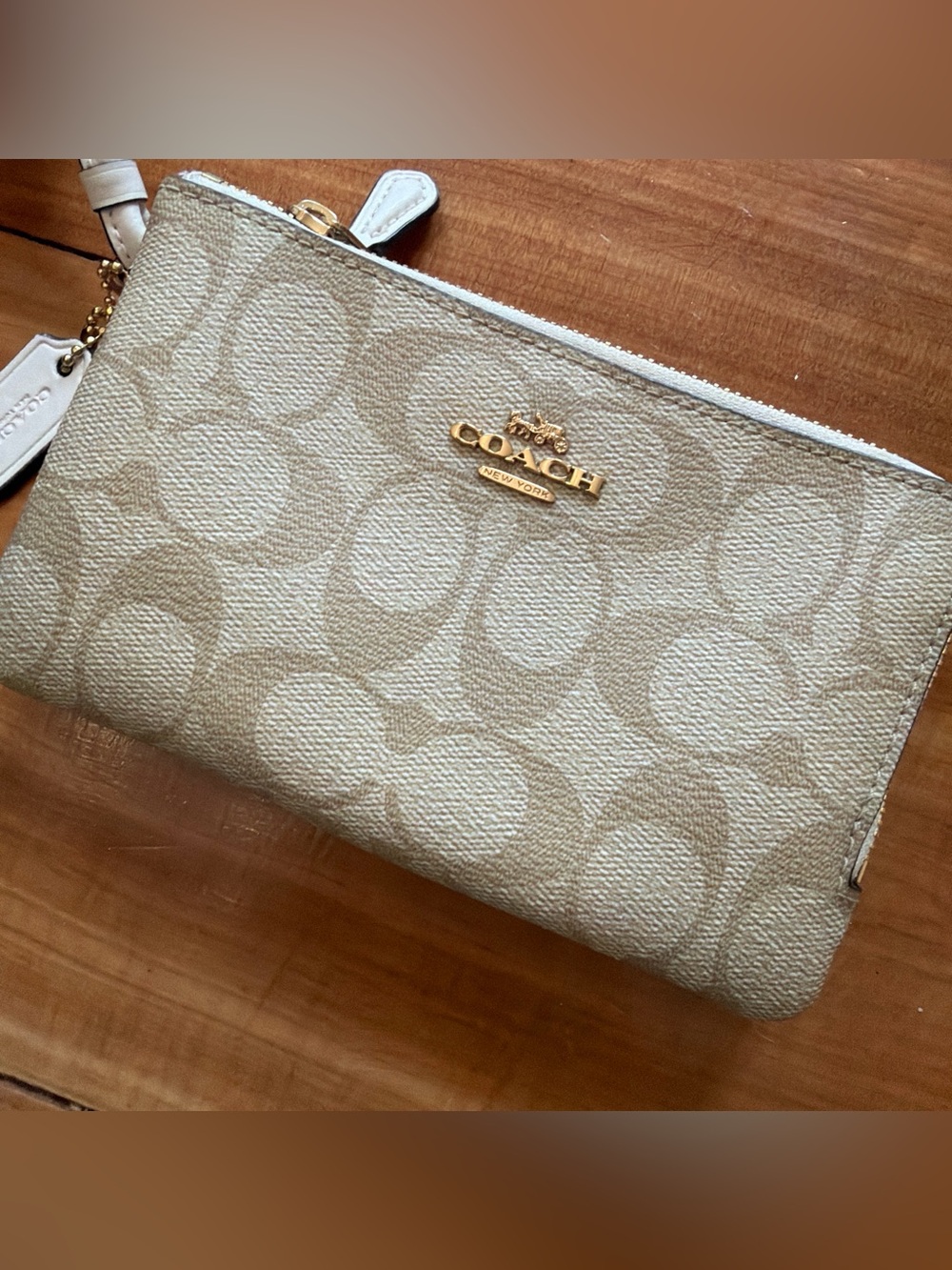 Coach Beige leather Wristlet with Cream Leather Tag and Gold Hardware
